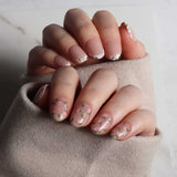 Fall florals nail art. Mismatched manicure. Reusable nail extensions. 