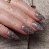 Glitter nails. Encapsulated glitter. Reusable nail extensions. 