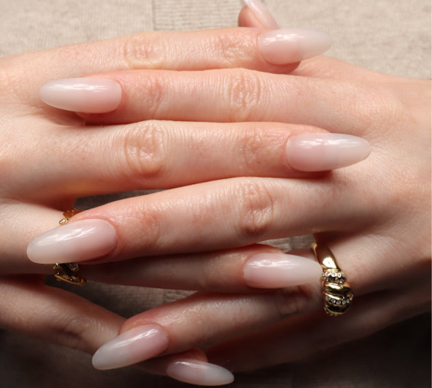 Reusable nail extensions in long almond length.