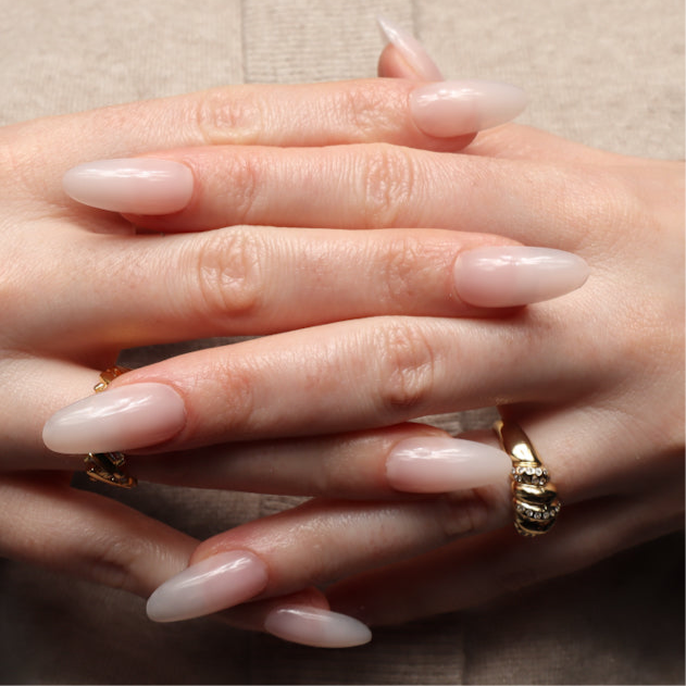 Reusable nail extensions in long almond length.