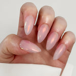 Reusable nail extensions in long almond length chrome nails. 