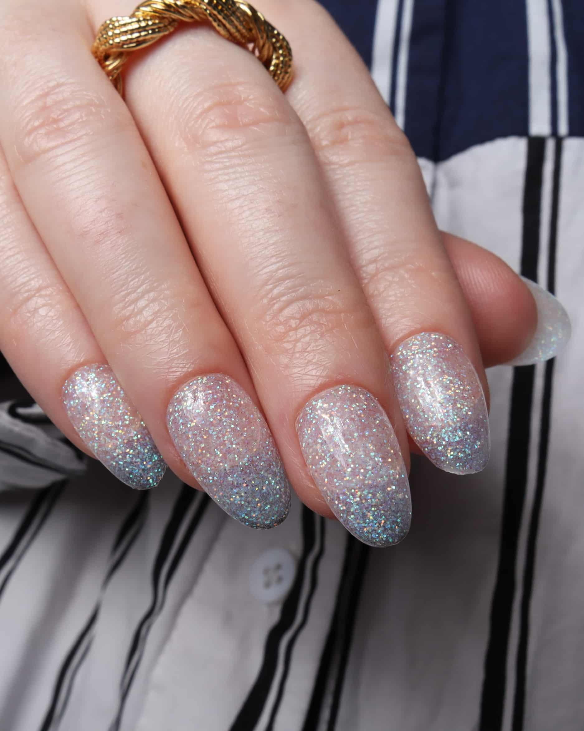 Glitter nails. Encapsulated glitter. Reusable nail extensions. 