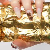 Reusable nail extensions chocolate 3D art in long almond length.