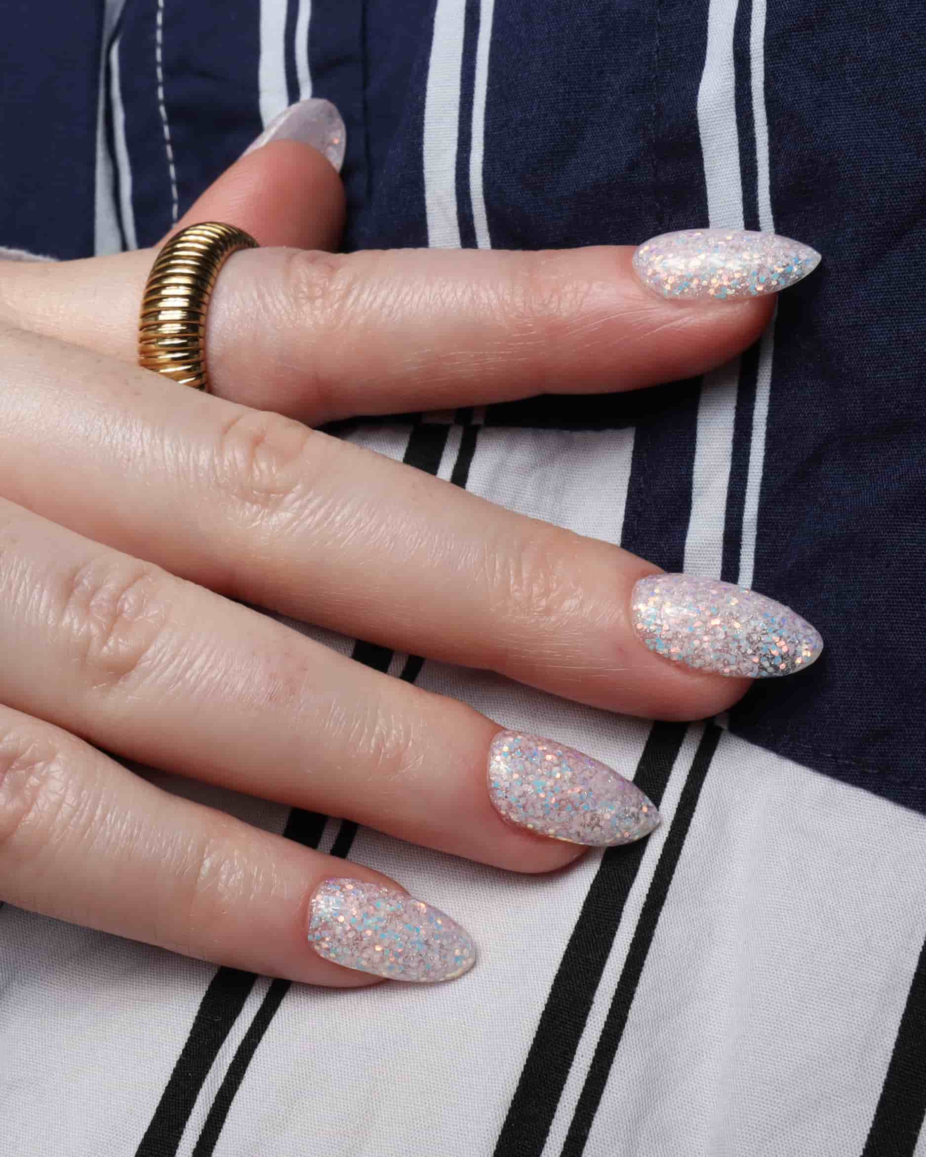 Glitter nails. Encapsulated glitter. Reusable nail extensions. 