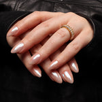 Reusable nail extensions in short almond length chrome nails. 