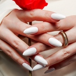 White solid color Reusable nail extensions in long almond length. 