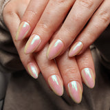 Reusable nail extensions in short almond length chrome nails. 