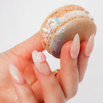 Reusable nail extensions macarons 3D art in long almond length.