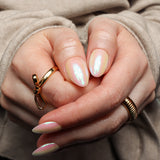 Reusable nail extensions in short almond length chrome nails. 