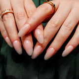 Reusable nail extensions in long almond length.