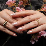 Reusable nail extensions in short almond length chrome nails. 