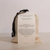 Palm and sole balm melt packaging with instructions on a beige background