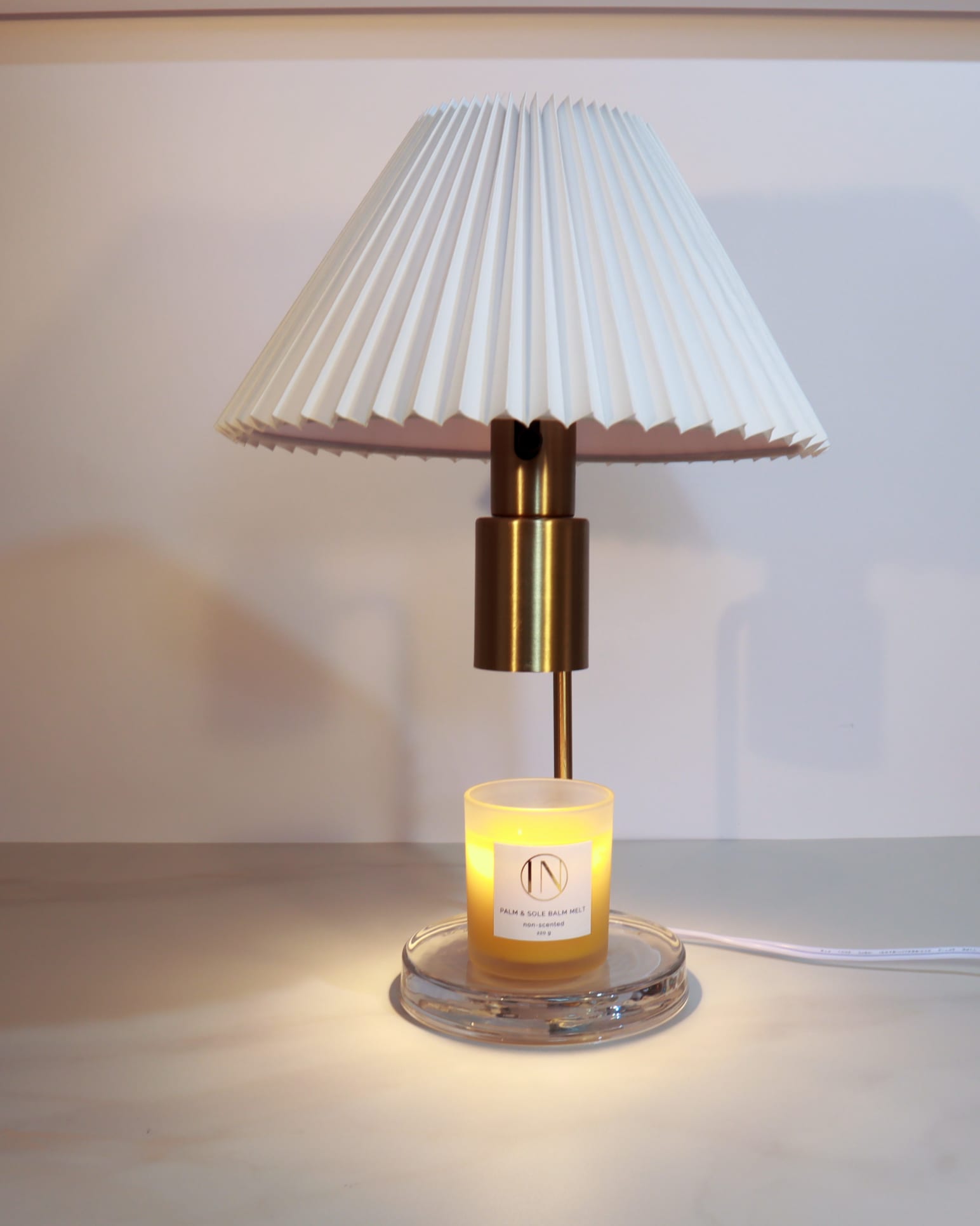 palm and sole balm melt by inglass nails. 