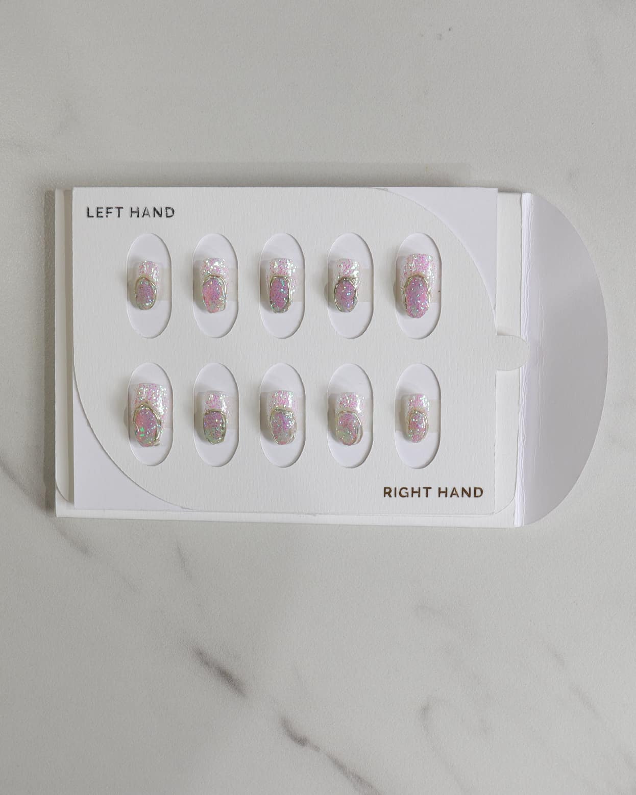 Set of nail art designs on a display card with 'LEFT HAND' and 'RIGHT HAND' labels.