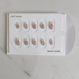 Set of nail art designs on a display card with 'LEFT HAND' and 'RIGHT HAND' labels.