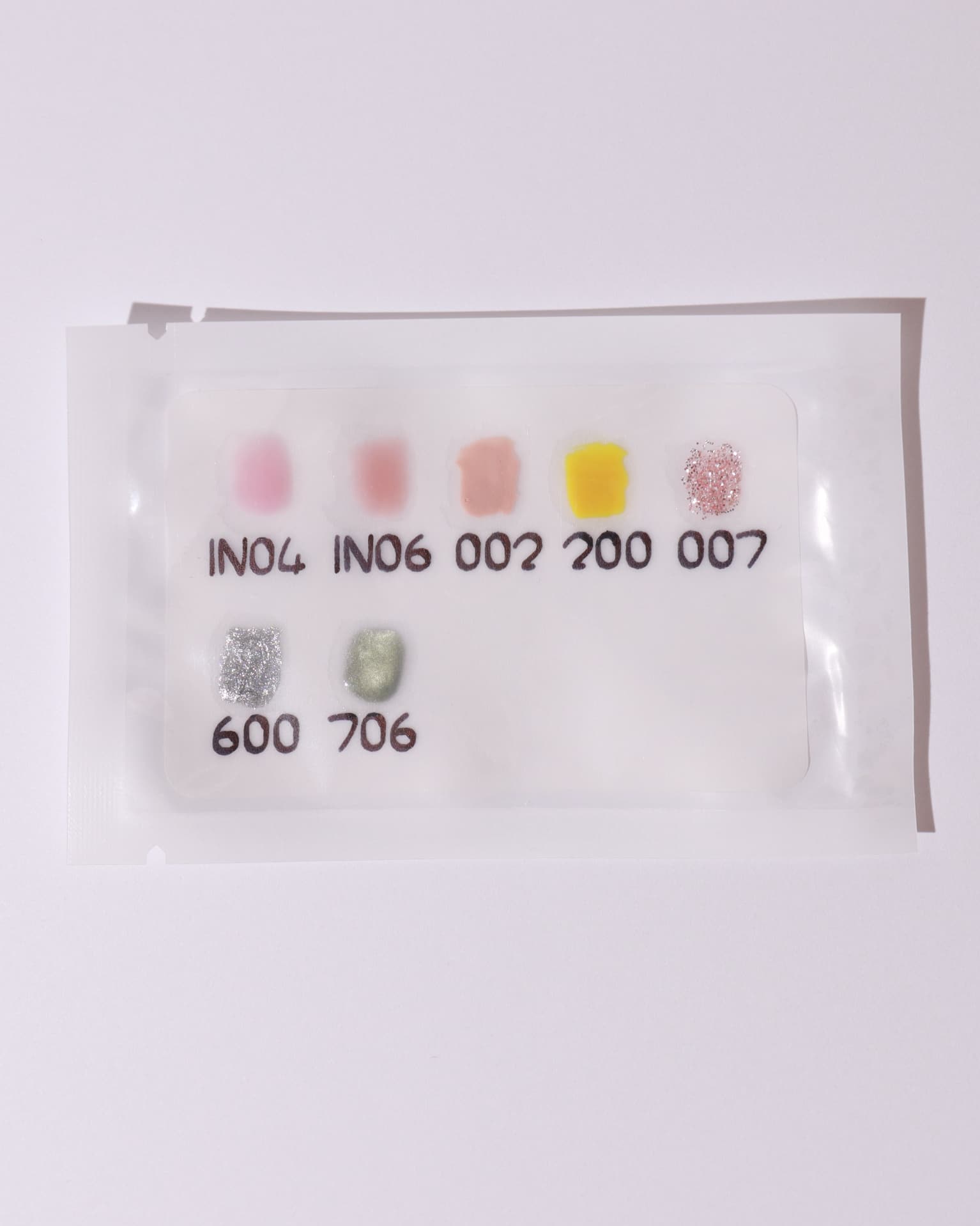 Color swatches in a white background  sealed in a bag
