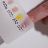Color swatches in a white background  with a model hand