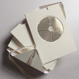 Stack of beige boxes by inglass nails decorative cutout on a light gray background lass 