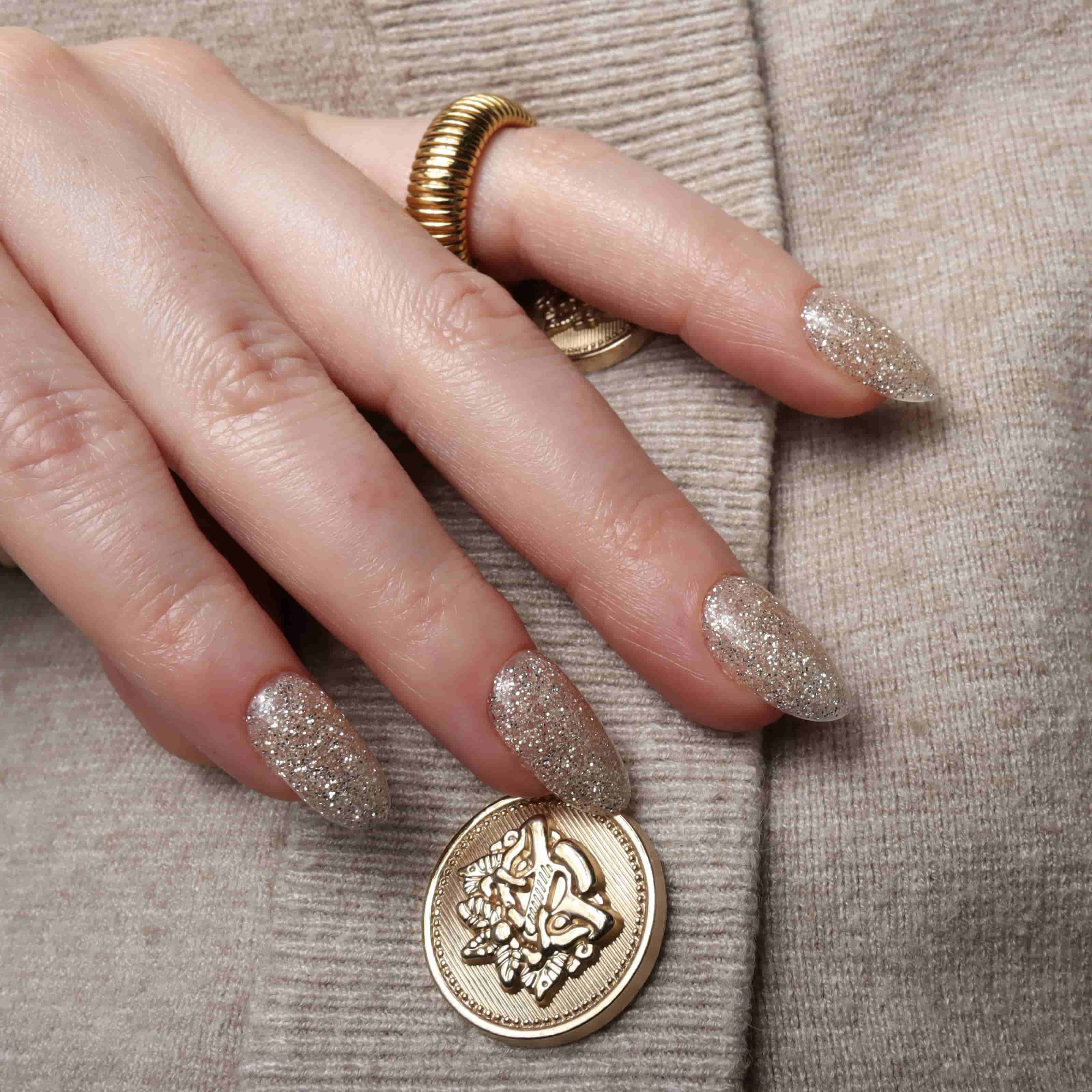 Glitter nails. Encapsulated glitter. Reusable nail extensions. 