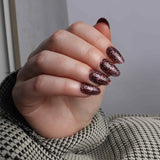 Glitter nails. Encapsulated glitter. Reusable nail extensions. 