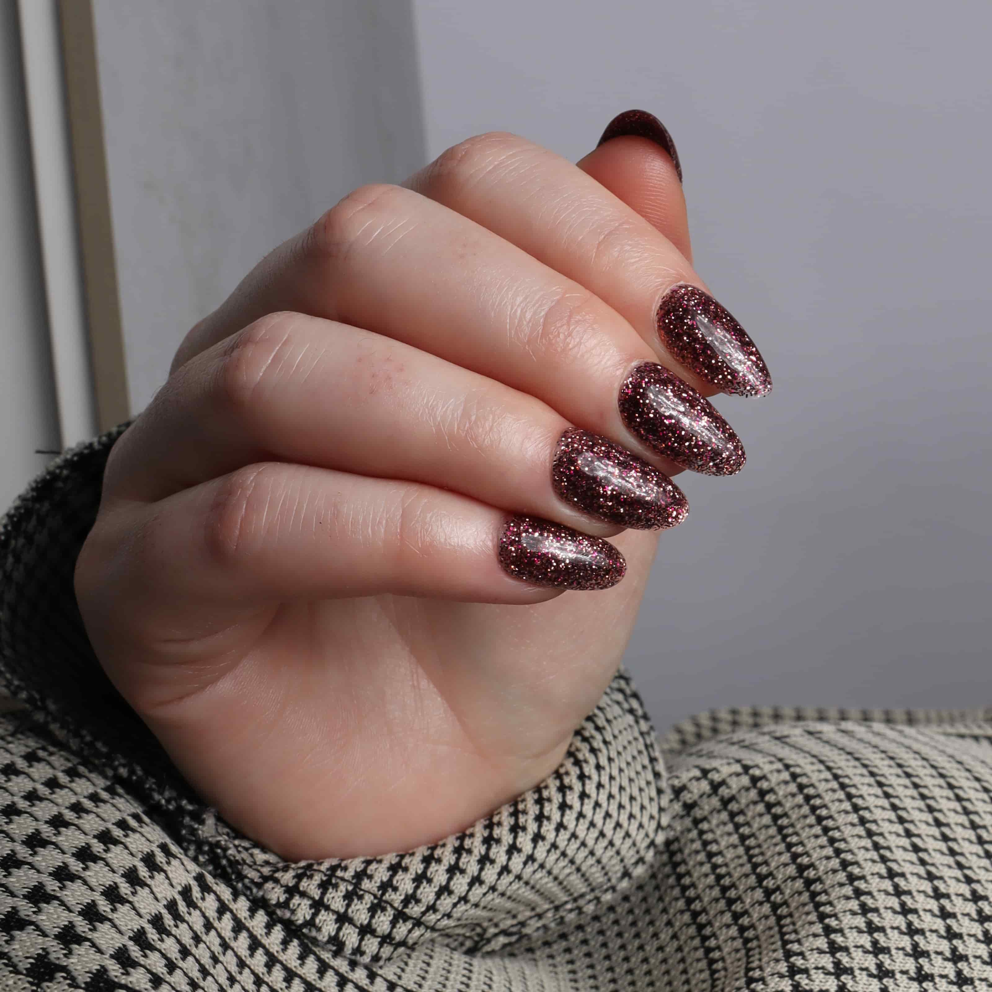 Glitter nails. Encapsulated glitter. Reusable nail extensions. 