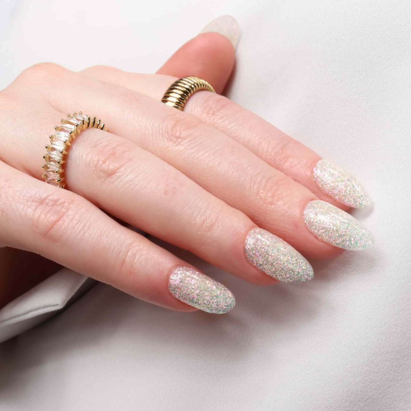 Glitter nails. Encapsulated glitter. Reusable nail extensions. 