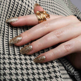 Glitter nails. Encapsulated glitter. Reusable nail extensions. 