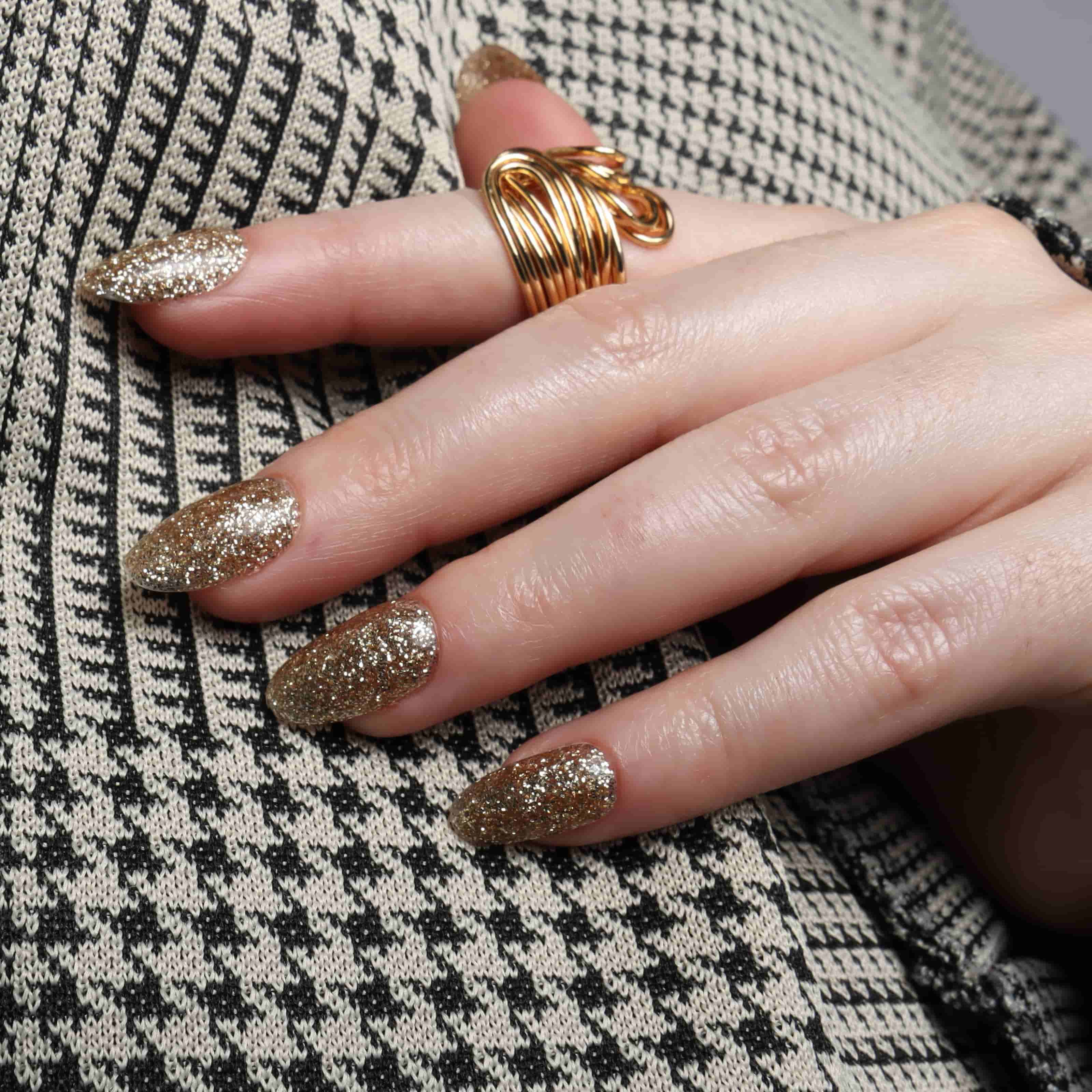 Glitter nails. Encapsulated glitter. Reusable nail extensions. 