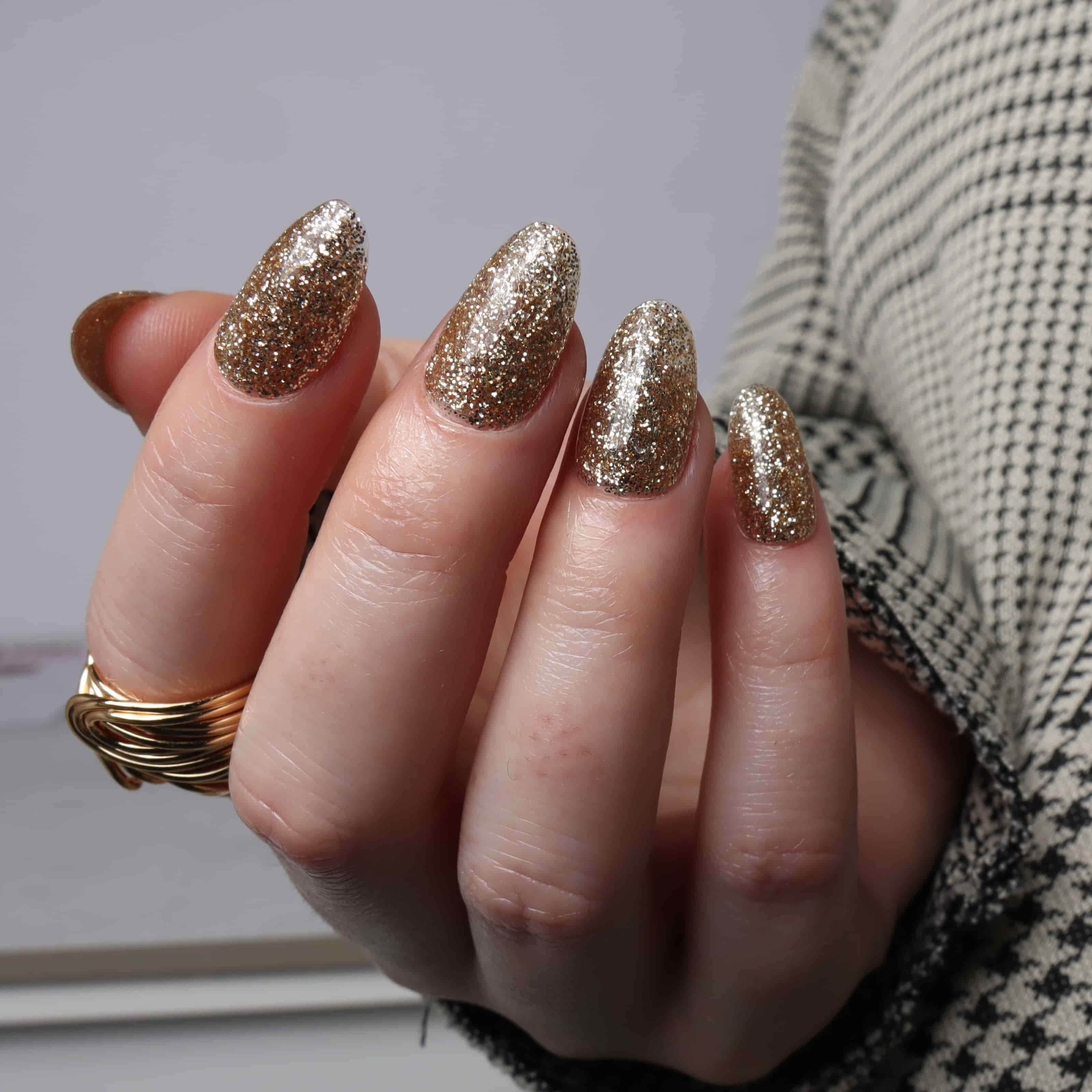 Glitter nails. Encapsulated glitter. Reusable nail extensions. 