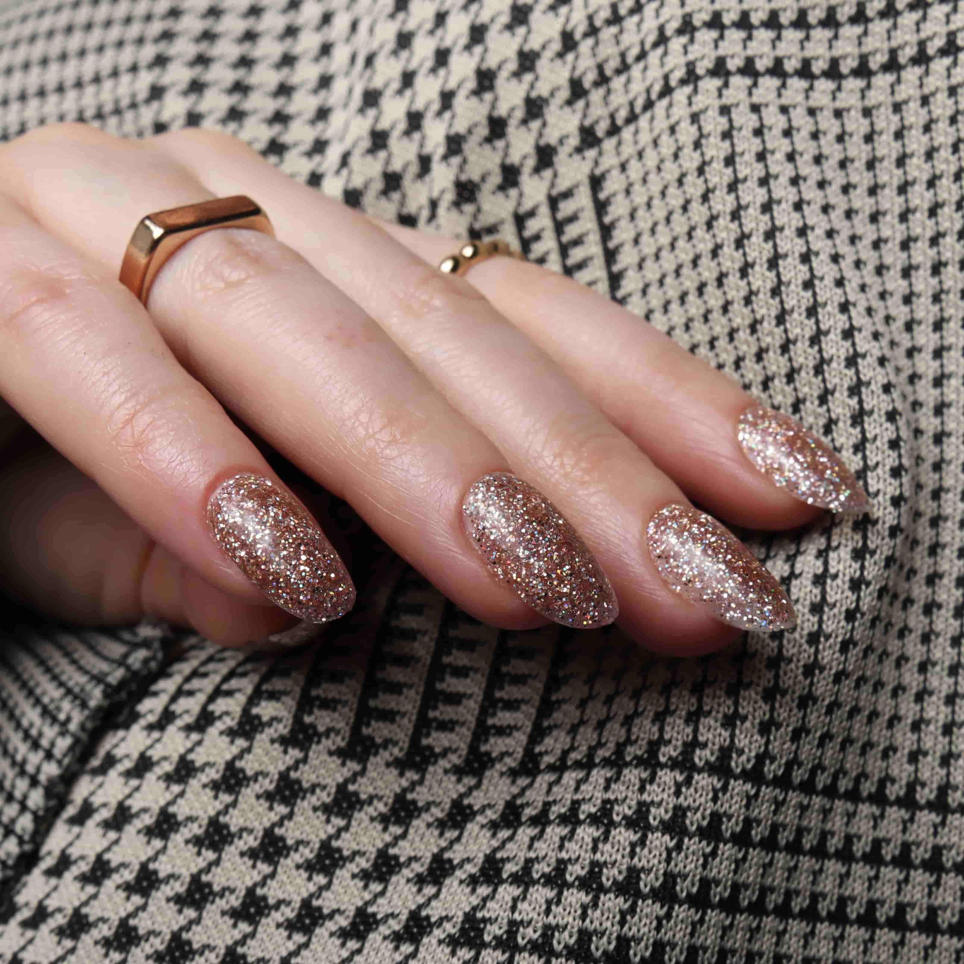 Glitter nails. Encapsulated glitter. Reusable nail extensions. 