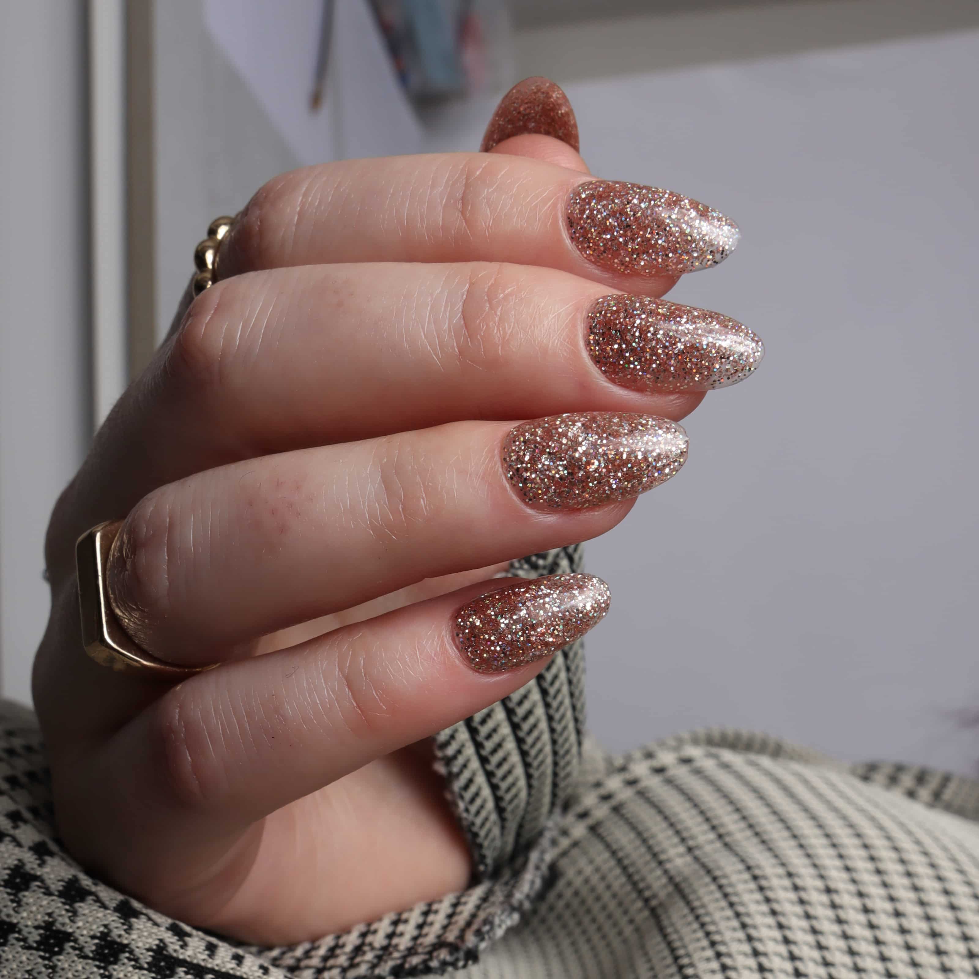 Glitter nails. Encapsulated glitter. Reusable nail extensions. 