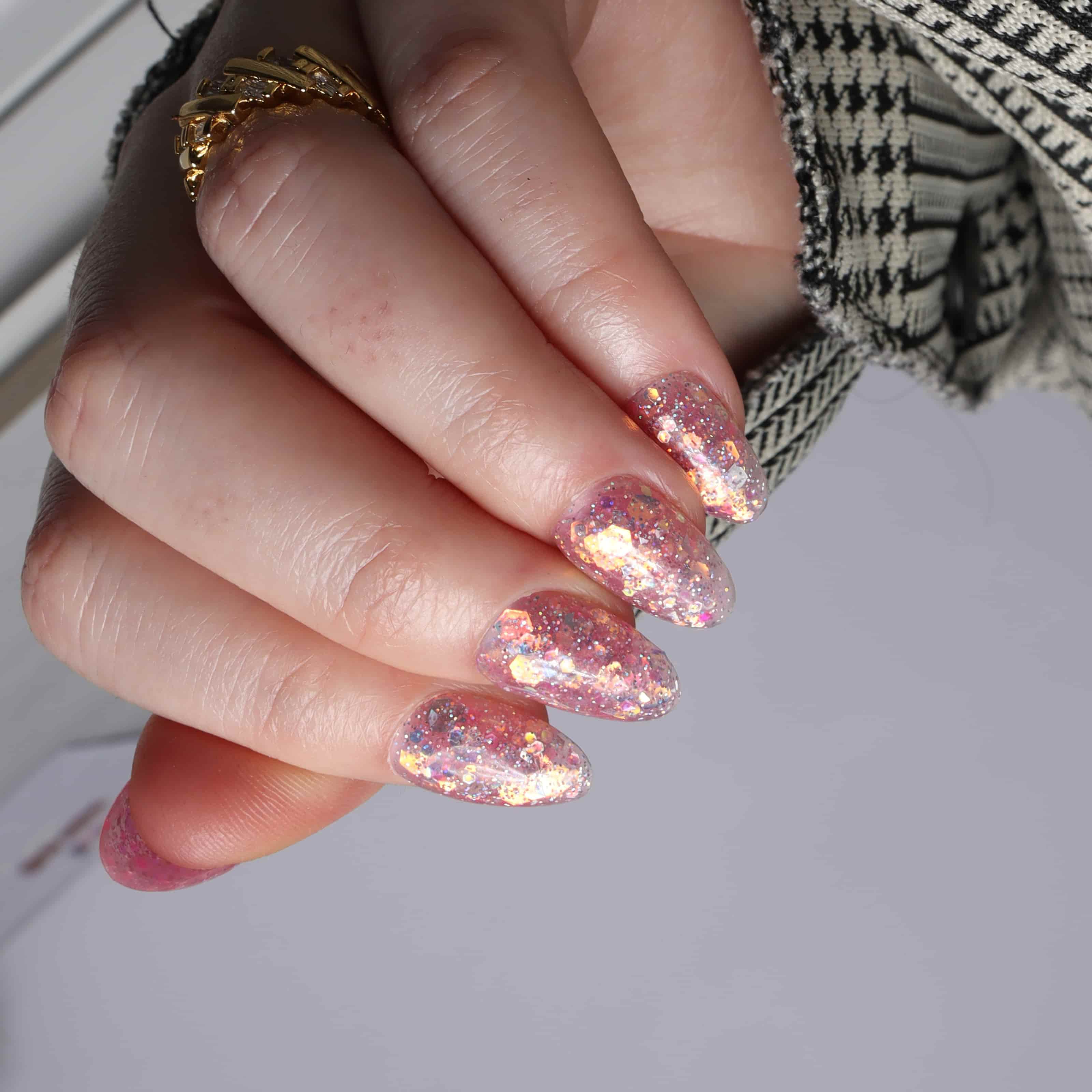 Glitter nails. Encapsulated glitter. Reusable nail extensions. 