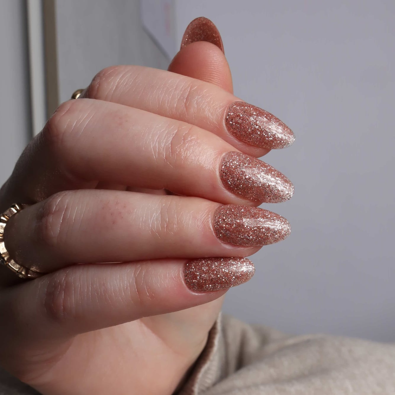 Glitter nails. Encapsulated glitter. Reusable nail extensions. 