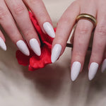 White solid color Reusable nail extensions in long almond length. 