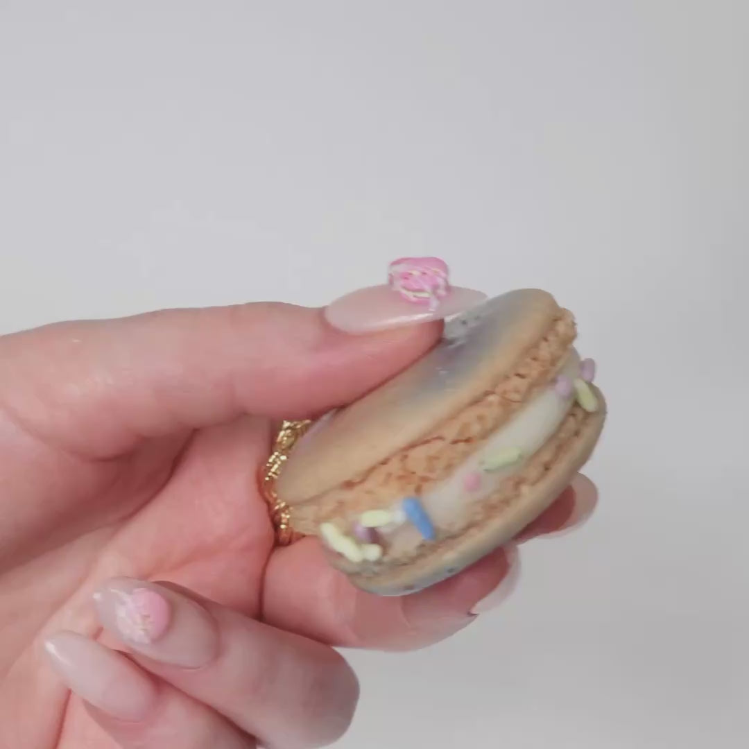 Reusable nail extensions macarons 3D art in long almond length.