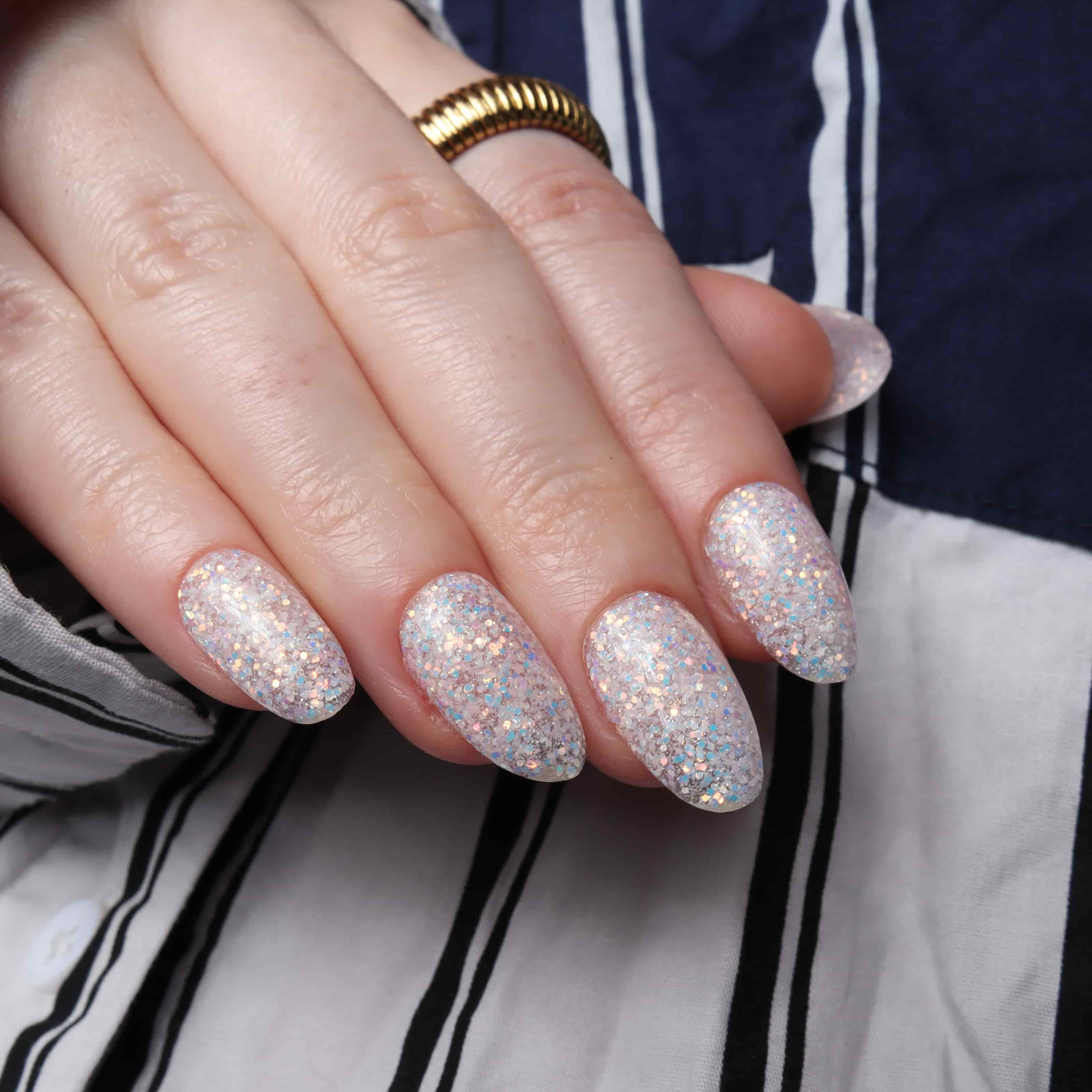 Glitter nails. Encapsulated glitter. Reusable nail extensions. 