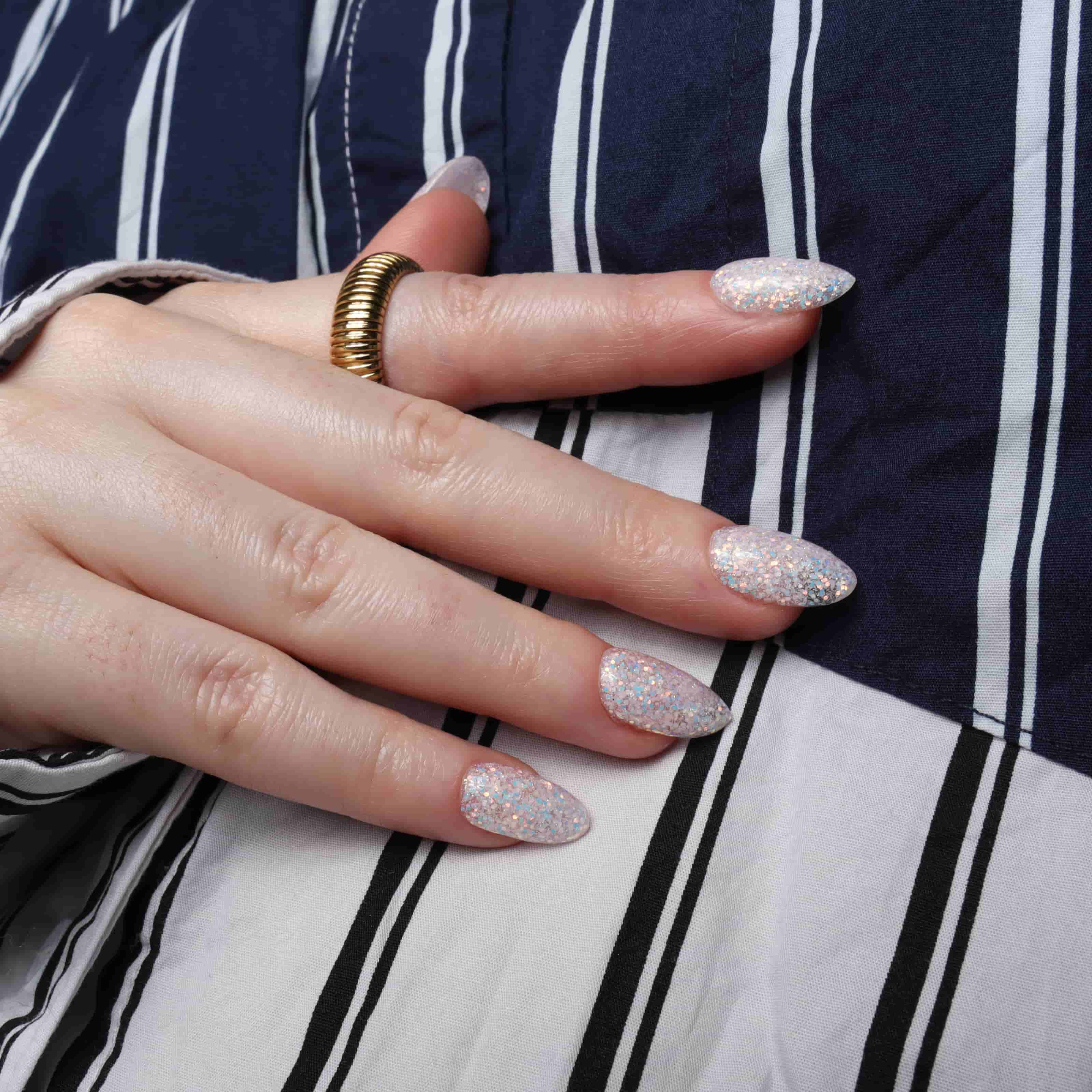 Glitter nails. Encapsulated glitter. Reusable nail extensions. 