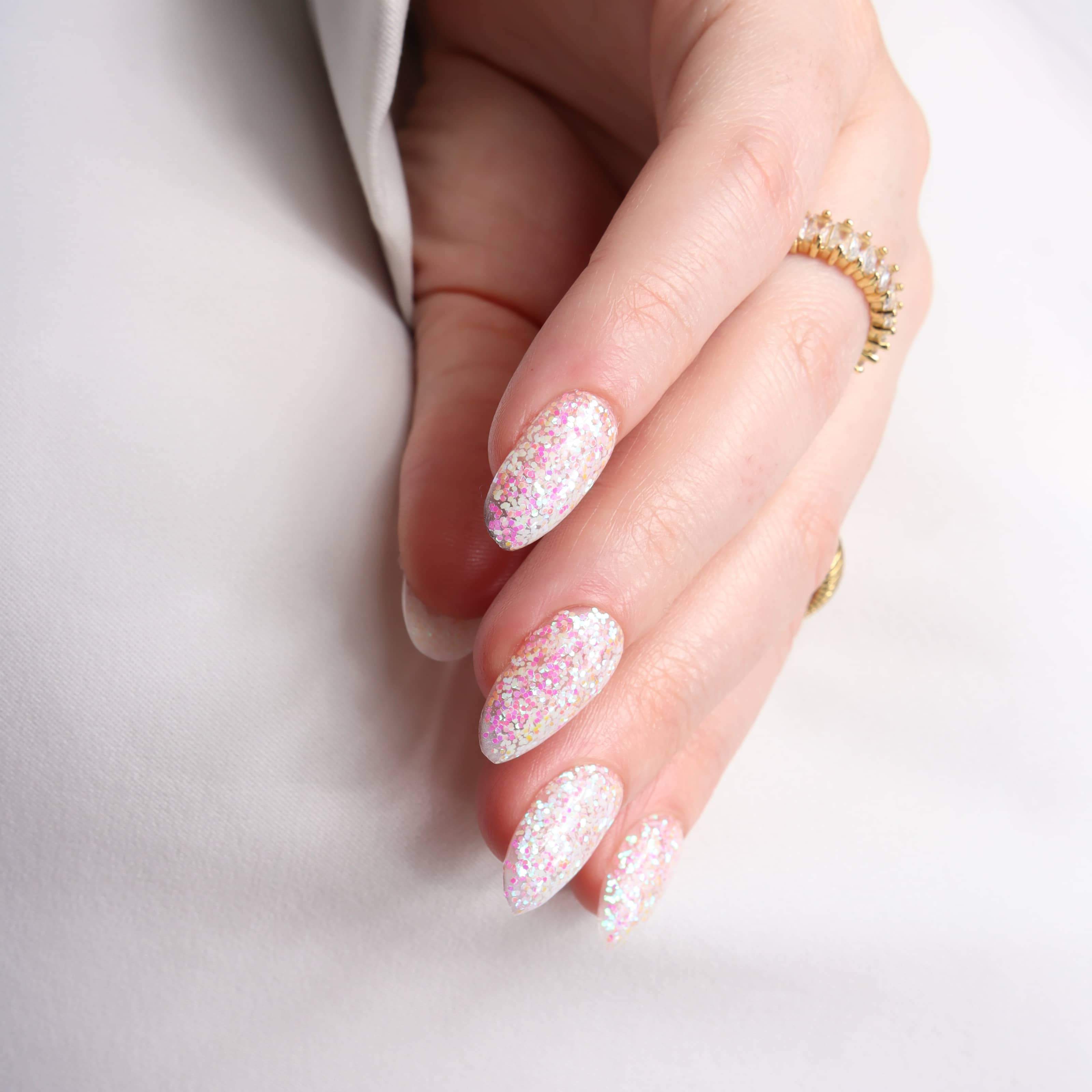 Glitter nails. Encapsulated glitter. Reusable nail extensions. 