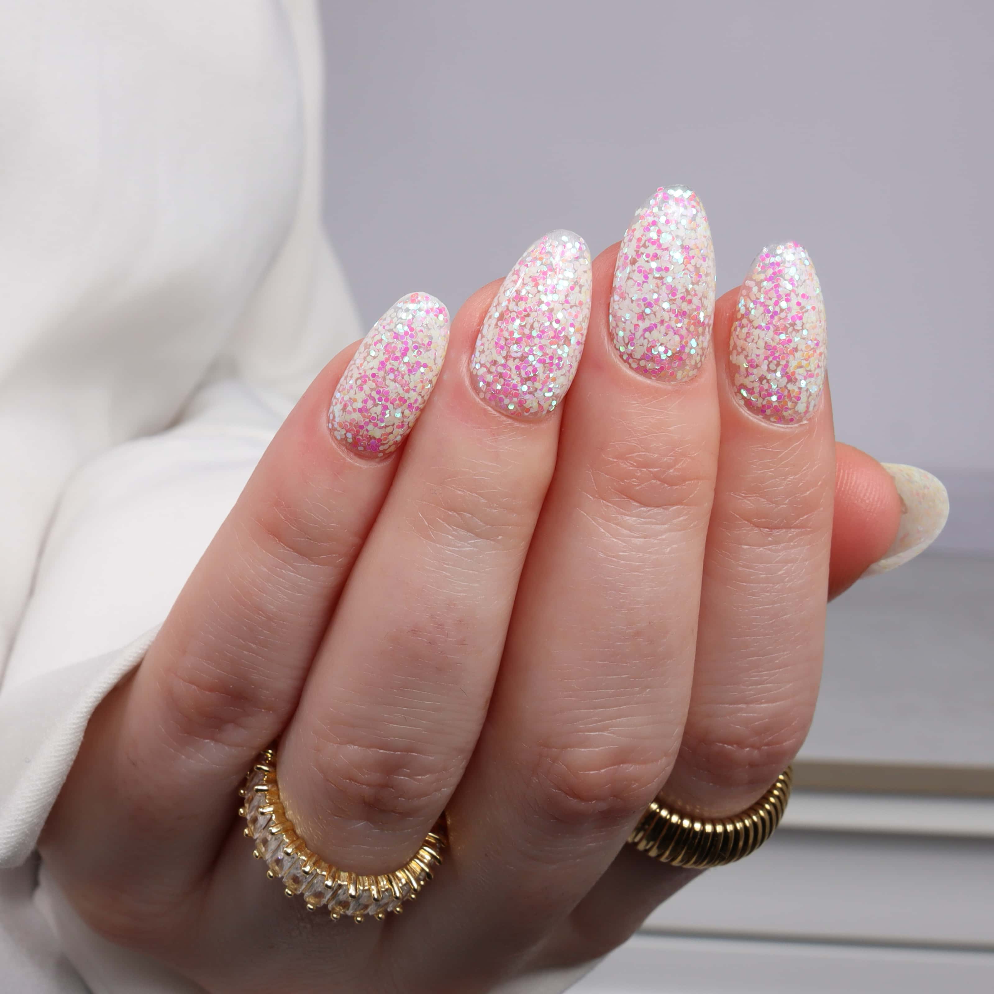 Glitter nails. Encapsulated glitter. Reusable nail extensions. 