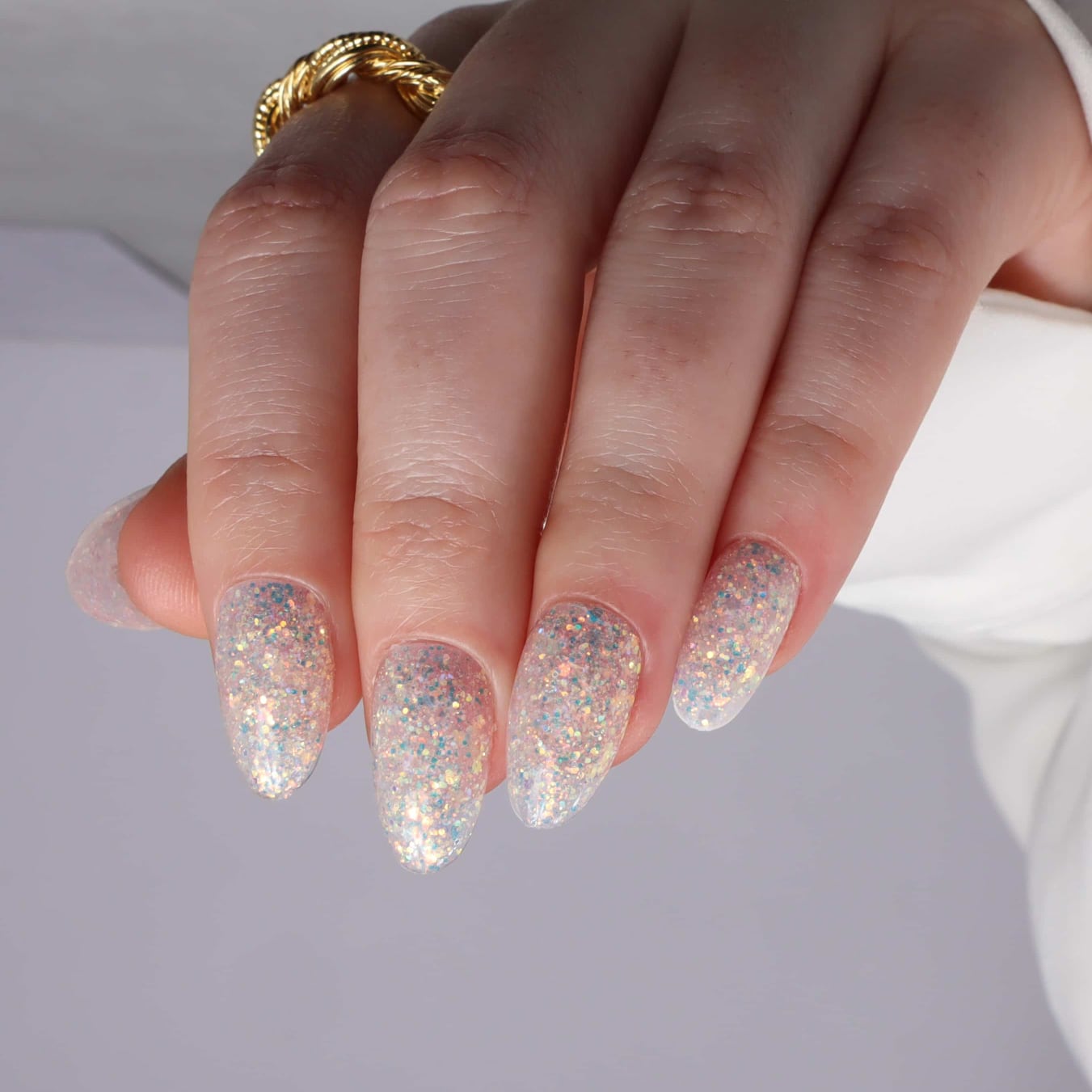 Glitter nails. Encapsulated glitter. Reusable nail extensions. 