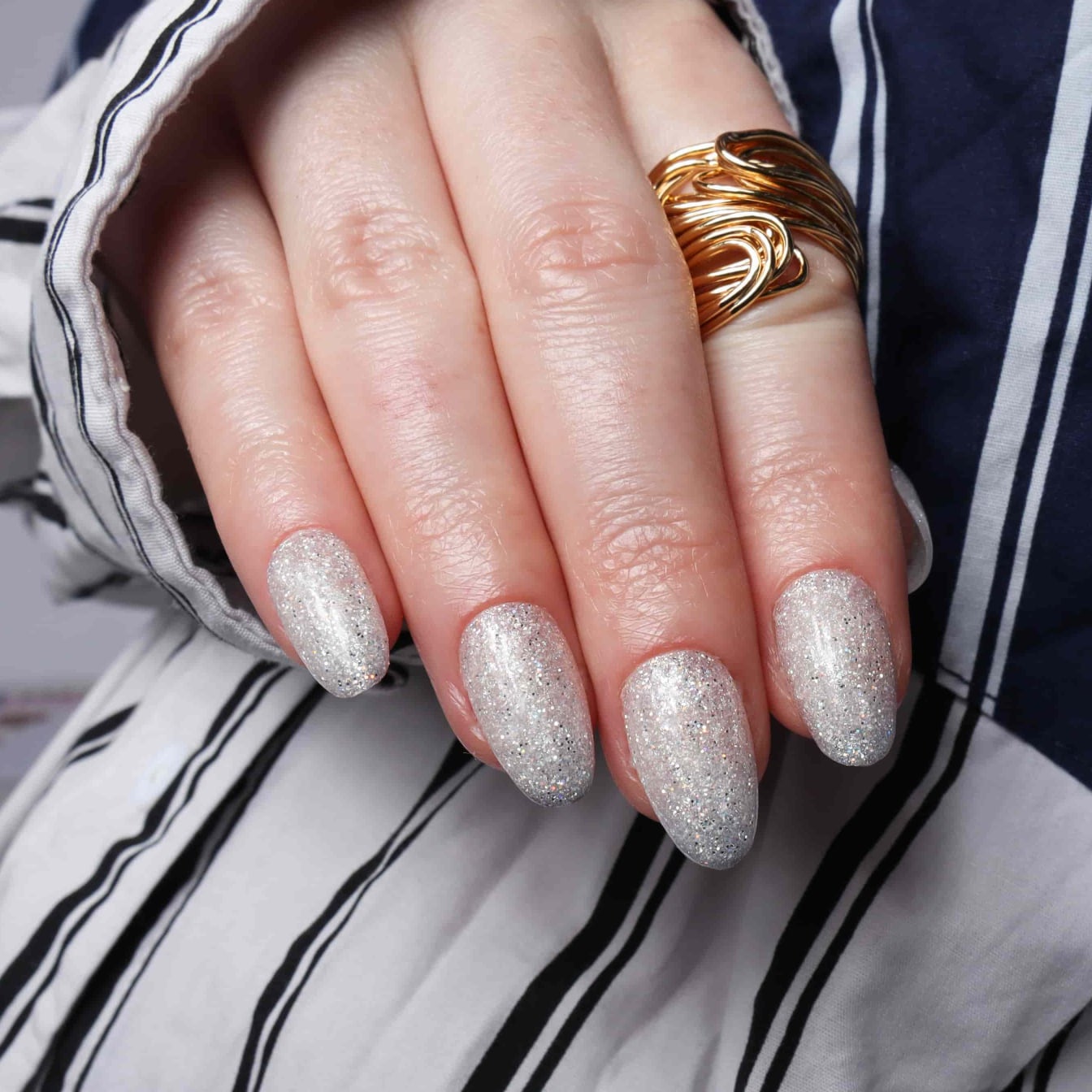 Glitter nails. Encapsulated glitter. Reusable nail extensions. 