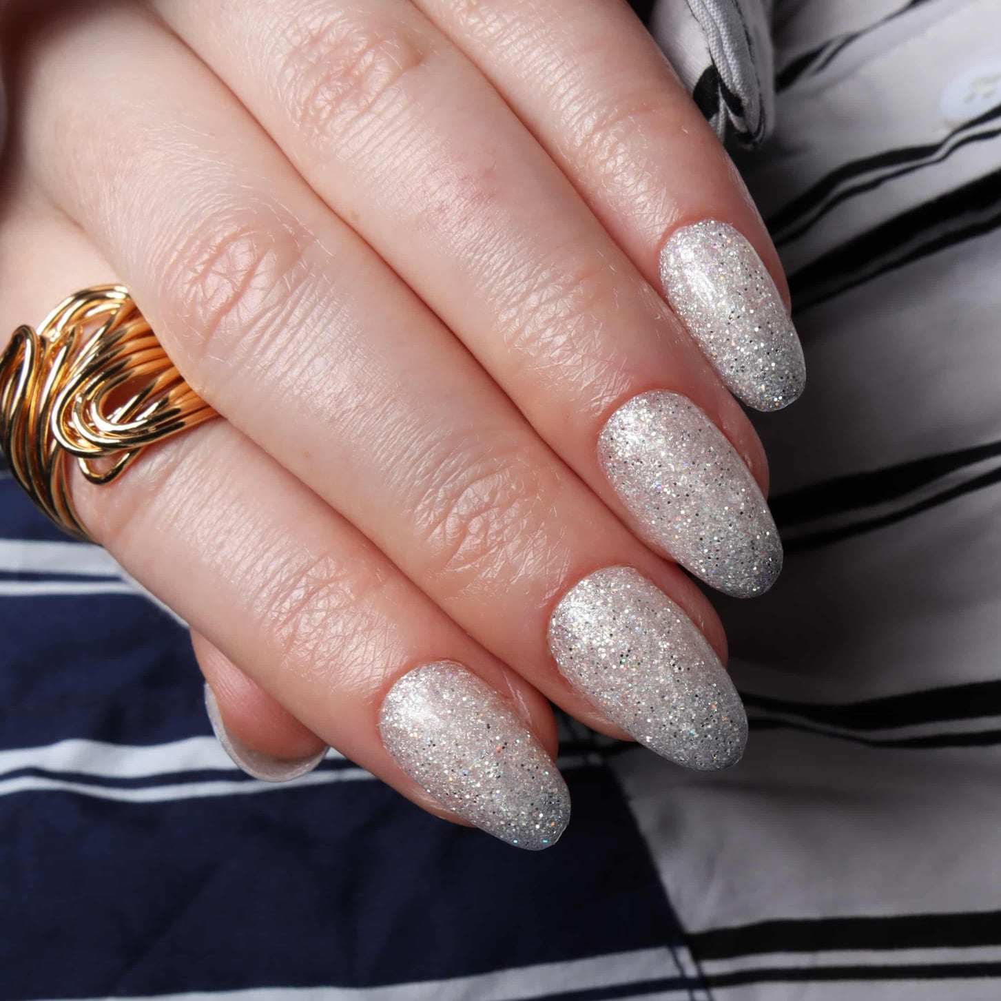 Glitter nails. Encapsulated glitter. Reusable nail extensions. 